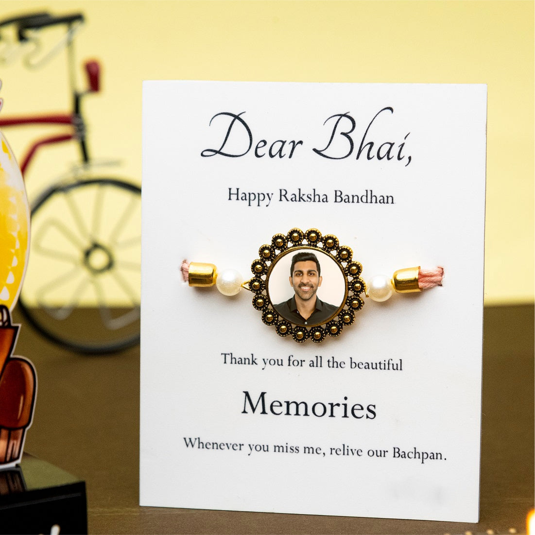 customized rakhi on a card
