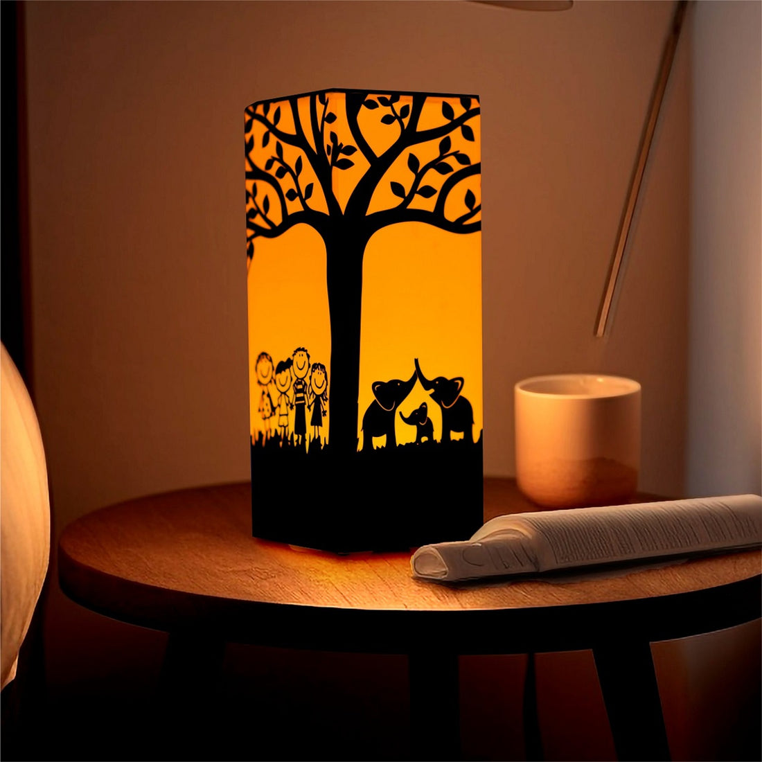 Table lamp with design of tree on it