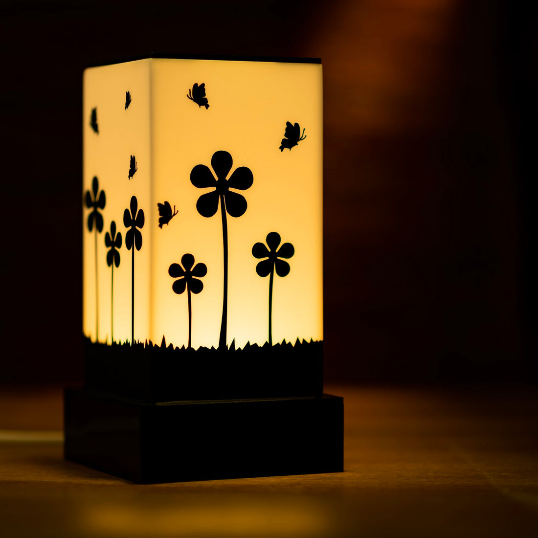 Lamp that celebrates nature flowers and butterflies