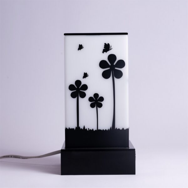 Lamp that celebrates nature flowers and butterflies