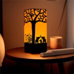 Table lamp with design of tree on it