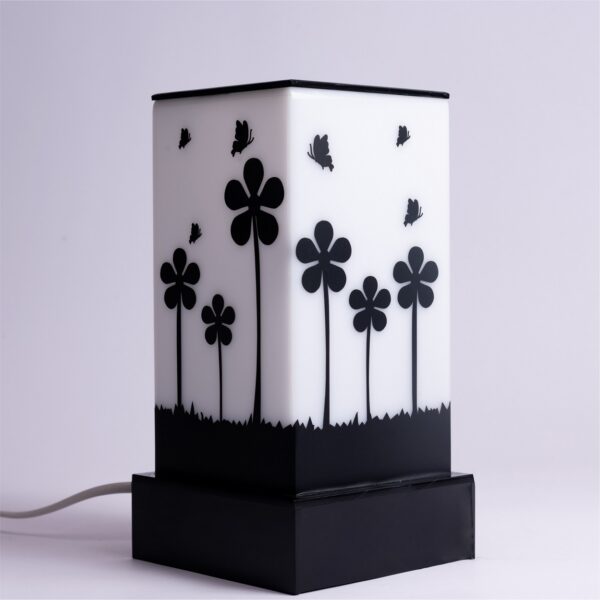 Lamp that celebrates nature flowers and butterflies