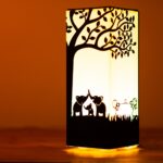 Table lamp with design of tree on it