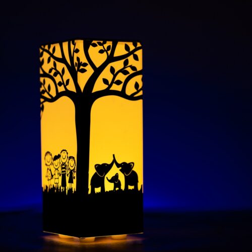 Table lamp with design of tree on it