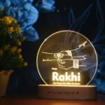 Sacred Tie: Engraved Acrylic Rakhi Lamp For Brother